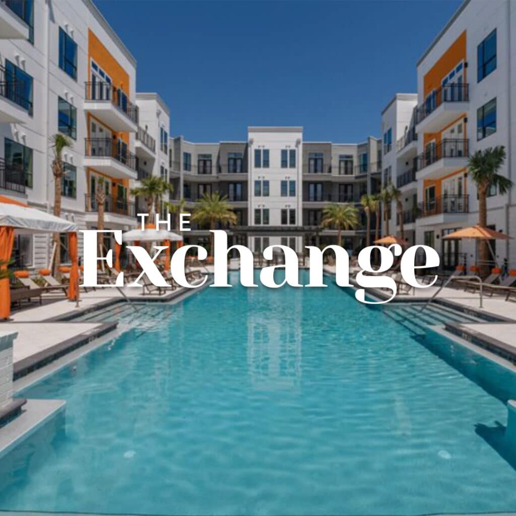 A modern apartment complex features a large swimming pool surrounded by lounge chairs and palm trees, labeled "The Exchange.